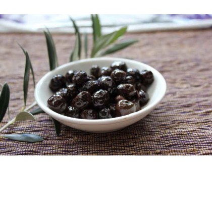 Baked olives with garden herbs
