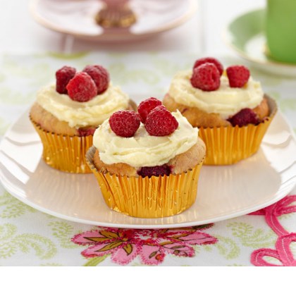 Hazelnut Berry Muffins with White Chocolate Frosting