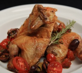 Butterflied Spatchcock with Tomato, Olive and Caper Sauce