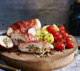 Prosciutto-Wrapped Chicken with Vine Tomatoes and Chat Potatoes