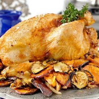 Roast Chicken with Macadamia, Almond and Orange Stuffing
