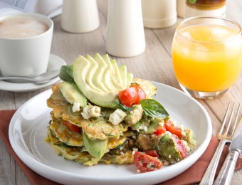 This is a photo of Smashed Avocado and Haloumi Fritters