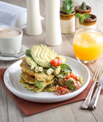 This is a photo of Smashed Avocado and Haloumi Fritters