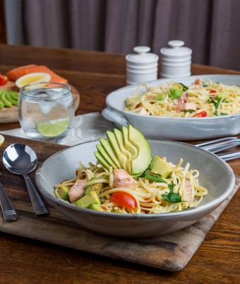 This is a photo of trout and avocado pasta