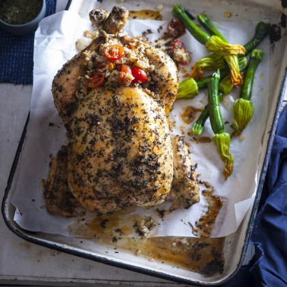 Herb Rub with Onion and Cherry Tomato Stuffing Roast Chicken