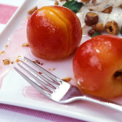 White Poached Nectarines with Sweetened Mint Cream and Toasted Hazelnuts
