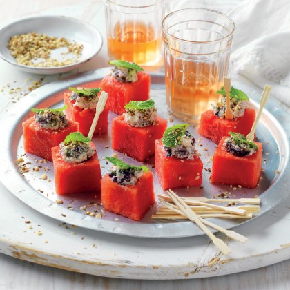 Watermelon cubes with feta, olives and mint
