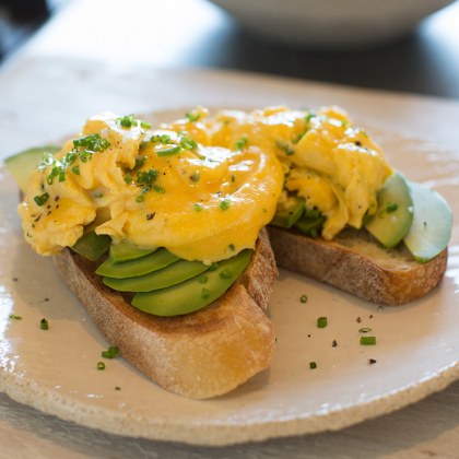 Creamy scrambled eggs with parmesan and chives
