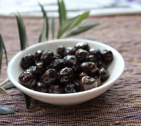 Baked olives with garden herbs
