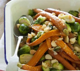 Warm salad of honeyed baby carrots, brussel sprouts and macadamias