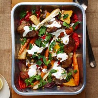 Spiced Lamb and Winter Vegetable Tray Bake with Yoghurt, Pine Nuts and Herbs