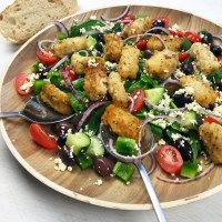 Salt and pepper squid with greek salad