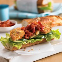 Crispy Crumbed Quail Baguette with Roasted Tomato Chilli Jam