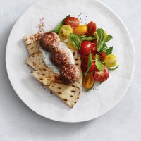 Turkey Kebabs with flatbread and mixed tomato and mint salad with fresh lemon