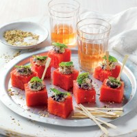 Watermelon cubes with feta, olives and mint