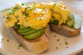 Creamy scrambled eggs with parmesan and chives