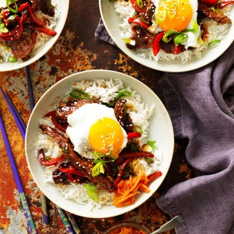 Korean BBQ beef bowl with kimchi and fried egg