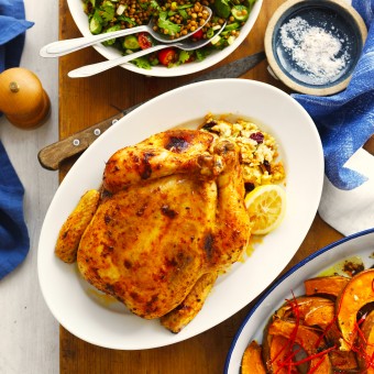 Couscous stuffed whole chicken roast recipe with spiced lemon butter