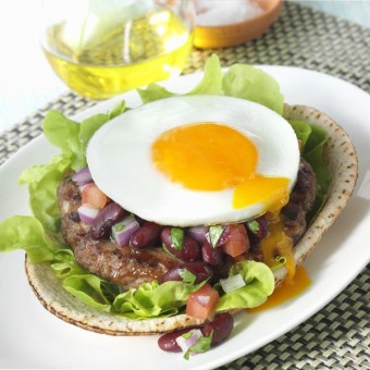Spicy Mexican burger with egg and red beans salsa