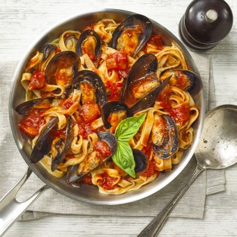 Mussels recipe made with fettuccine with napoli sauce 