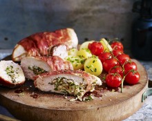 Prosciutto-Wrapped Chicken with Vine Tomatoes and Chat Potatoes
