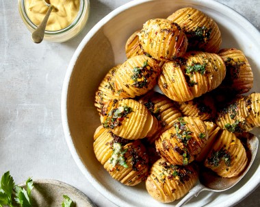 Roasted hasselback potatoes with herb butter