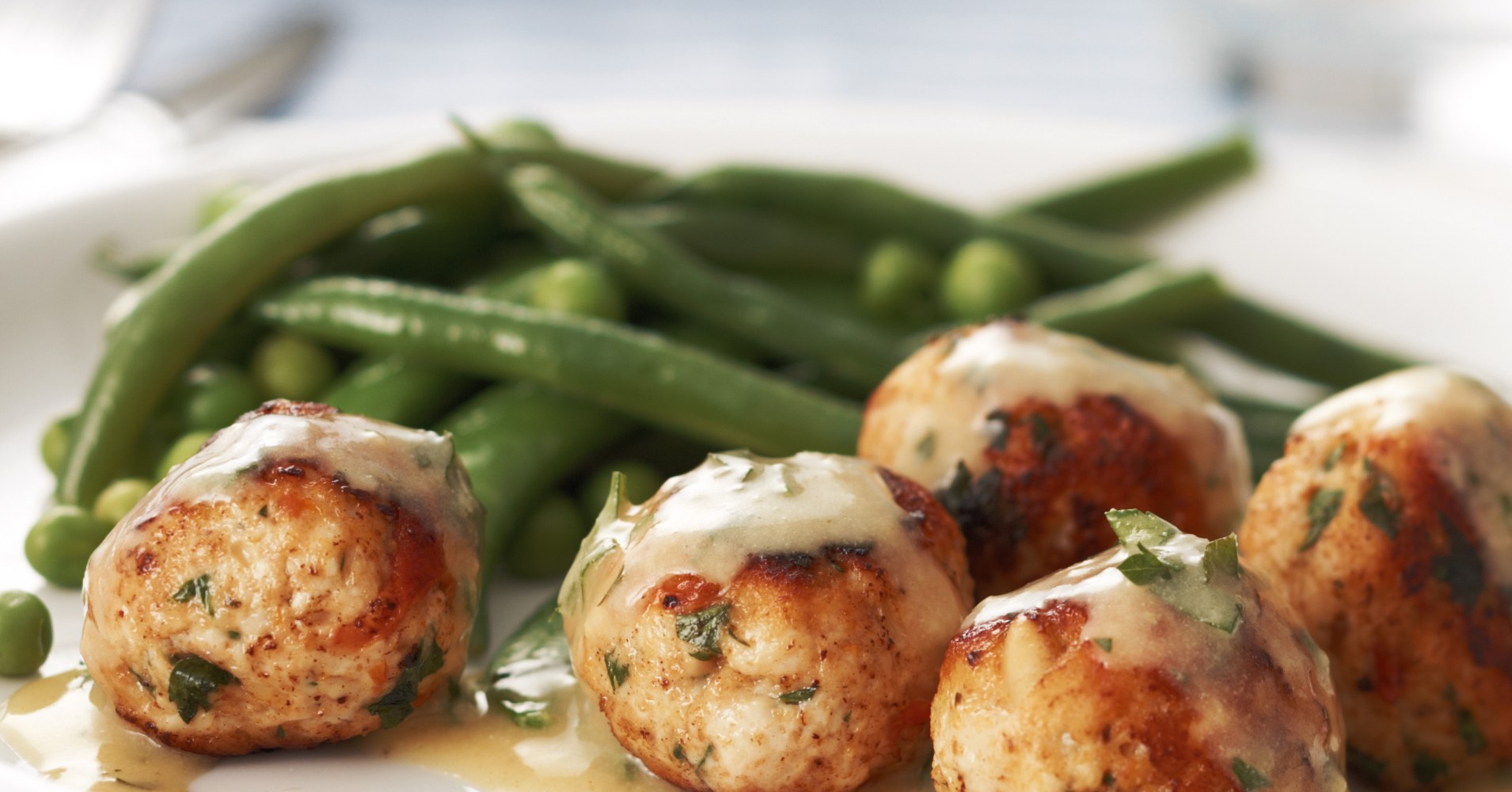 Chicken and sun-dried tomato meatballs with creamy mustard sauce Recipe | myfoodbook