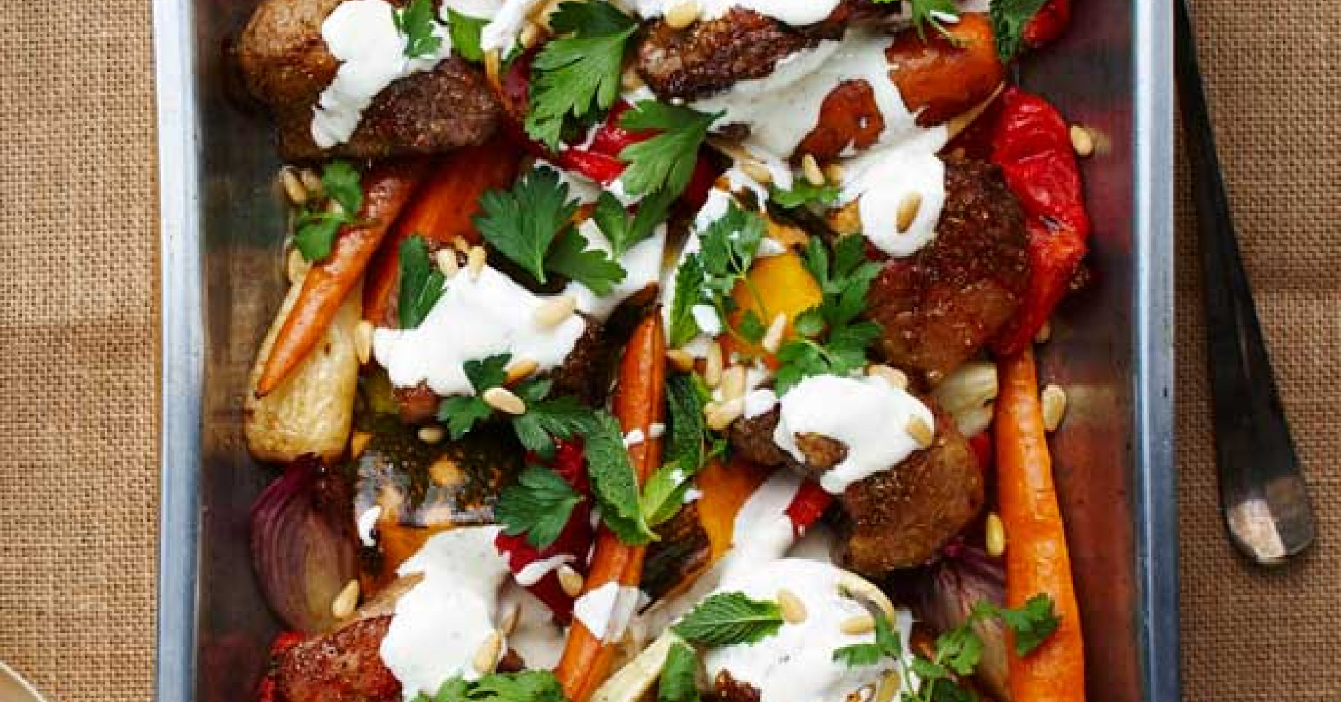 Spiced Lamb and Winter Vegetable Tray Bake with Yoghurt, Pine Nuts and Herbs Recipe | myfoodbook | E
