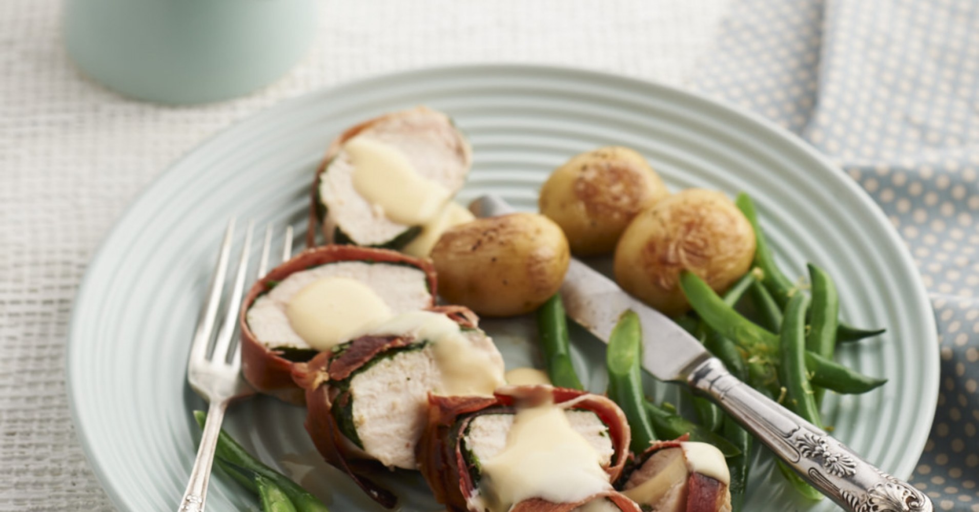 Spinach and Prosciutto Stuffed Chicken Breast with Cheese Sauce Recipe | myfoodbook