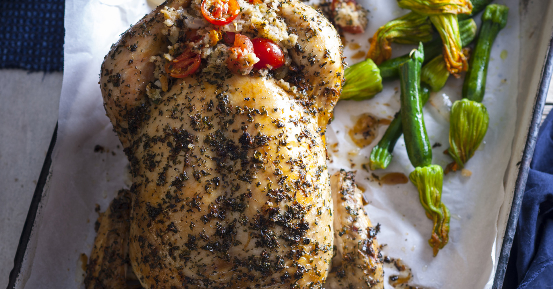 Herb Rub with Onion and Cherry Tomato Stuffing Roast Chicken Recipe | myfoodbook