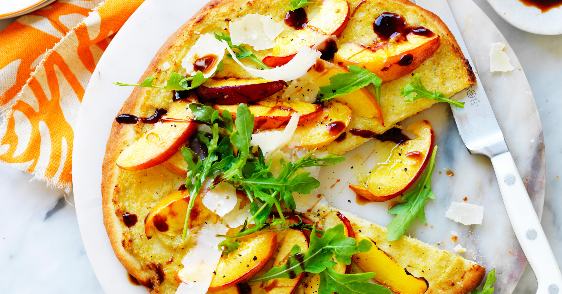 Yellow nectarine, artichoke and rocket pizza Recipe | myfoodbook