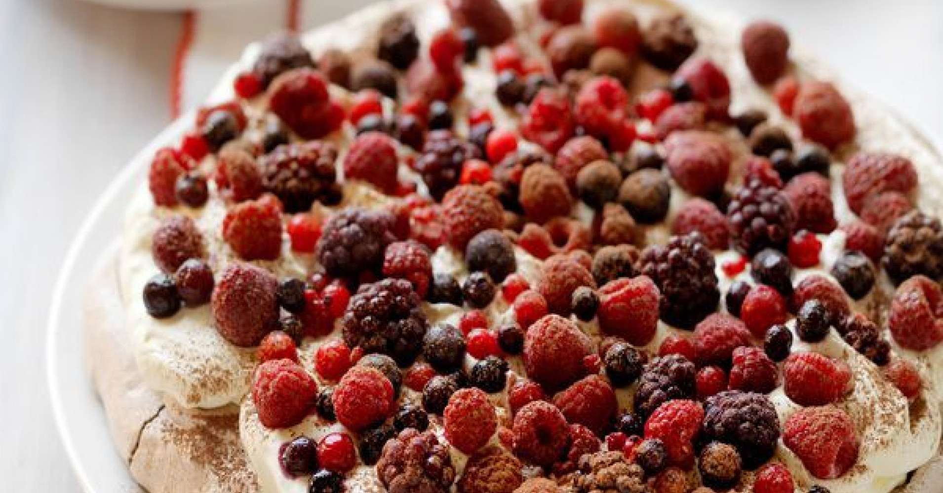 Mixed Berry & Chocolate Mousse Pavlova Recipe | myfoodbook