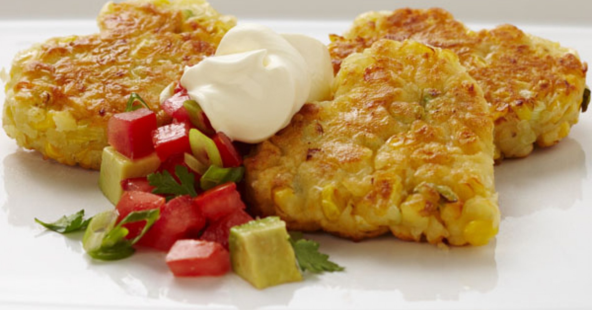 Love Heart Corn and Cheddar Fritters with Tomato Salsa and Sour Cream Recipe | myfoodbook