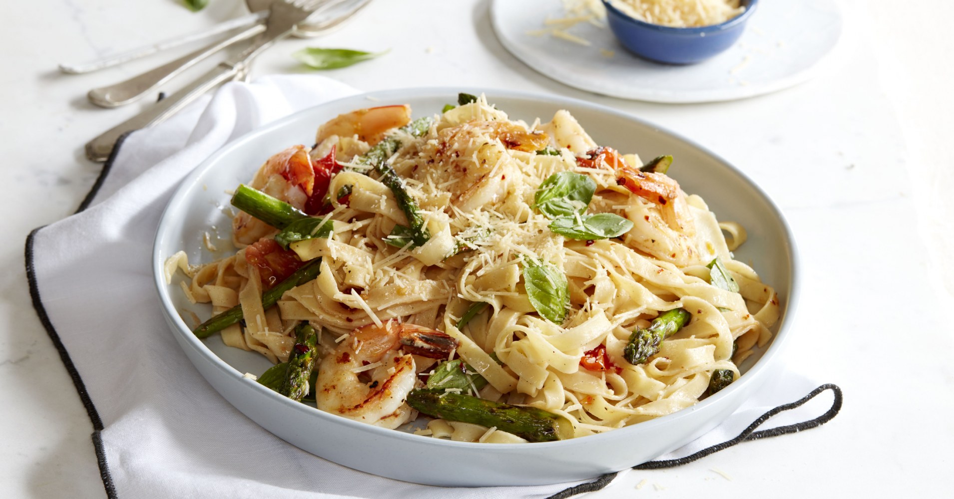 Chargrilled Asparagus and Tomato Fettuccine with King Prawns and Lemon Herb Butter Recipe | myfoodbook | Seafood pasta recipe