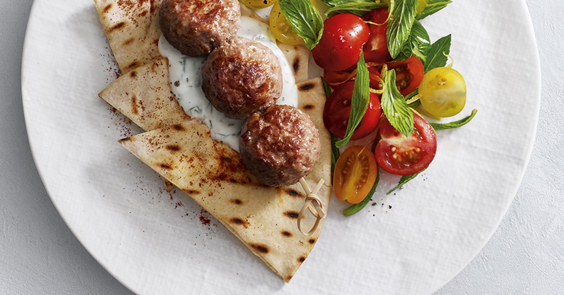 Turkey Kebabs with flatbread and mixed tomato and mint salad with fresh lemon Recipe myfoodbook