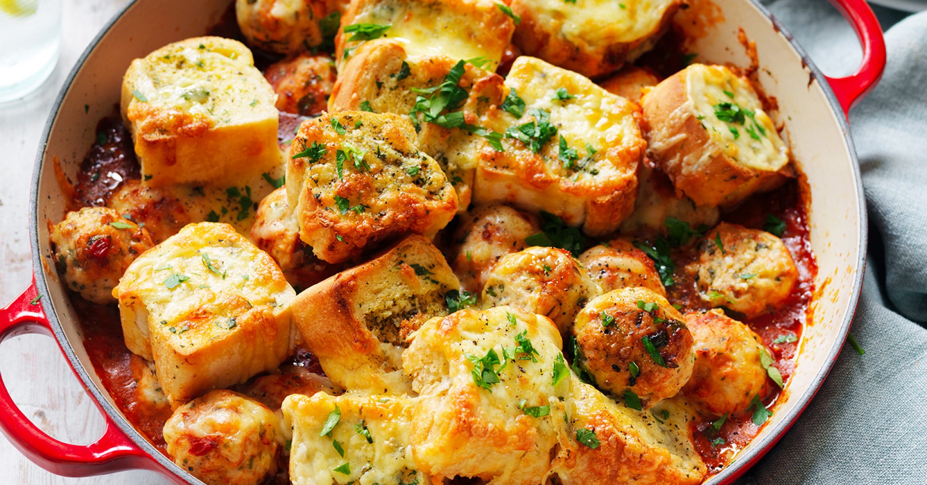 Turkey Meatball & Garlic Bread Bake Recipe | myfoodbook