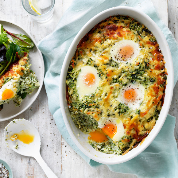 Healthy vegetarian rice bake with spinach and eggs