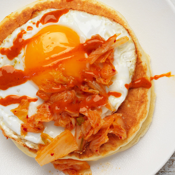 Easy pancake recipe with fried egg, kimchi and chilli sauce