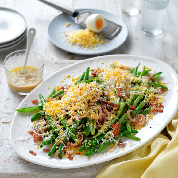 Bean salad with bacon and grated egg
