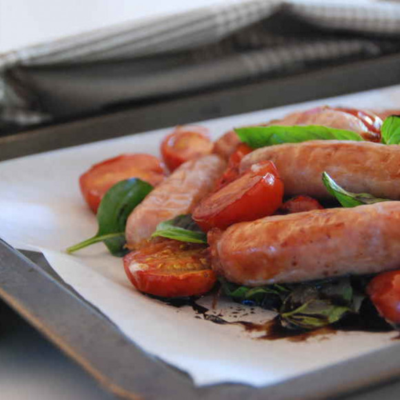 Baked Chipolatas & Balsamic Tomatoes
