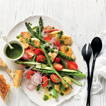 Simply stunning summer asparagus salad recipe with herbs and halloumi, just right for your next barbecue. You'll want to use the green herb dressing on other salad recipes too.