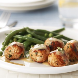 Chicken and sun-dried tomato meatballs with creamy mustard sauce 