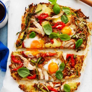 Heart healthy pizza with zucchini, eggs and herbs