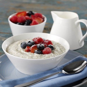 Creamy Porridge With Strawberries, Blueberries And Raspberries