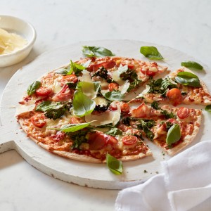 Baby Greens, Cherry Tomato and Prosciutto Pizza