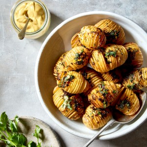 Roasted hasselback potatoes with herb butter