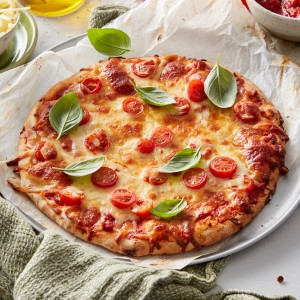 Margherita Pizza has to be one of the all time favourite pizza toppings. If you're looking for an easy pizza recipe, or what to know how to make the best pizza, try this pizza recipe. 