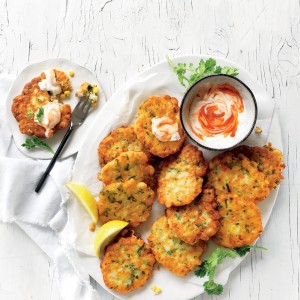Make these fresh corn fritters with prawns for a light lunch or as an easy appetiser. Corn fritters are perfect for finger food when served with a sriracha yoghurt.